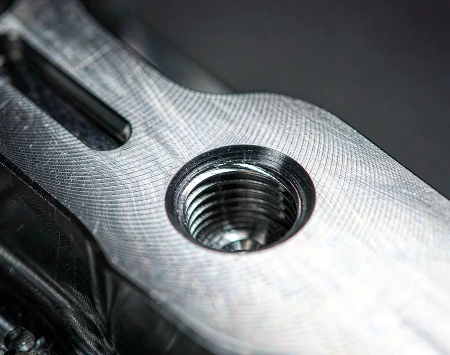 Machined bearing bore in an aluminum die casting